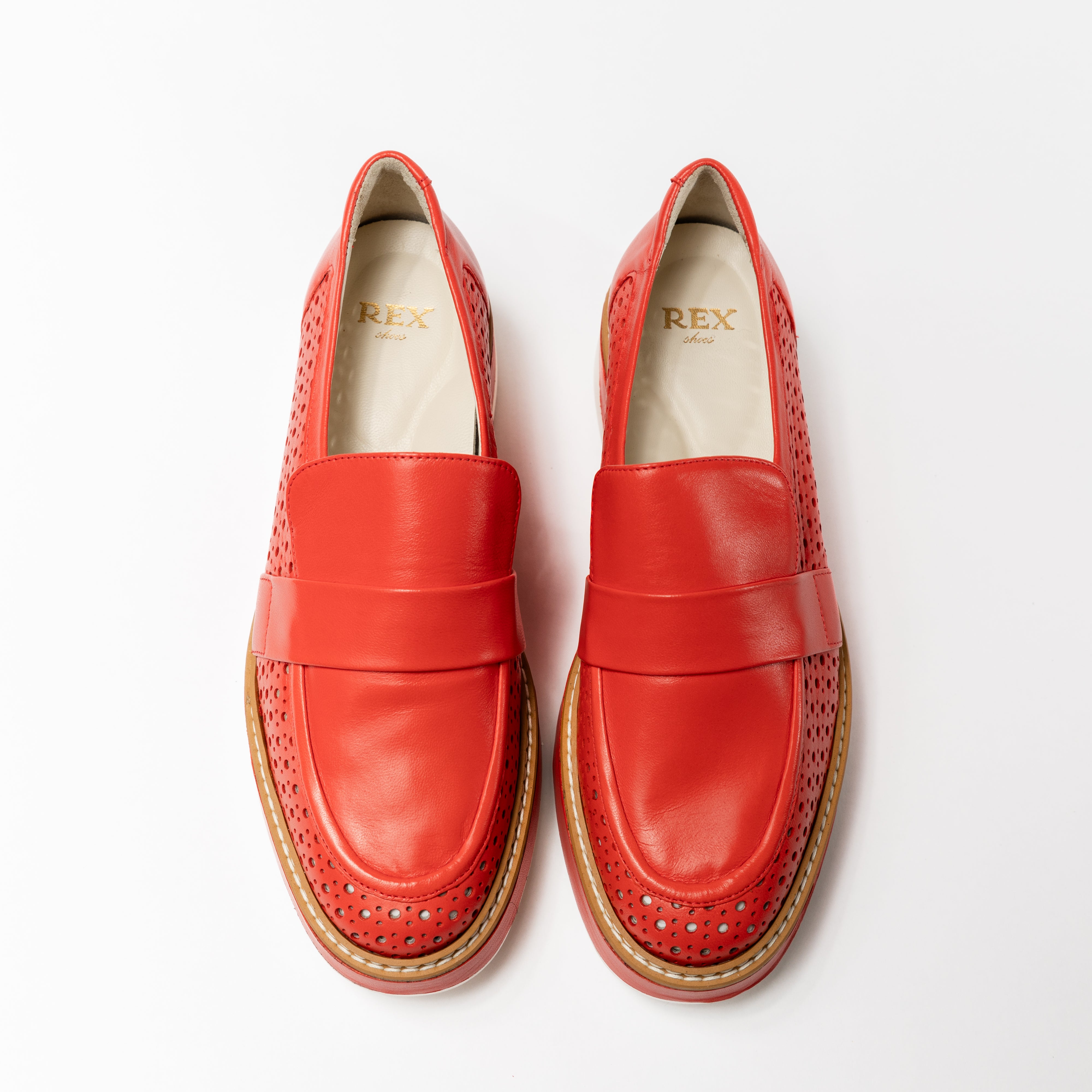 Top view of the Rex Shoes&#39; women&#39;s designer loafer, displaying the exquisite vamp and precision of the handcrafted leather construction.
