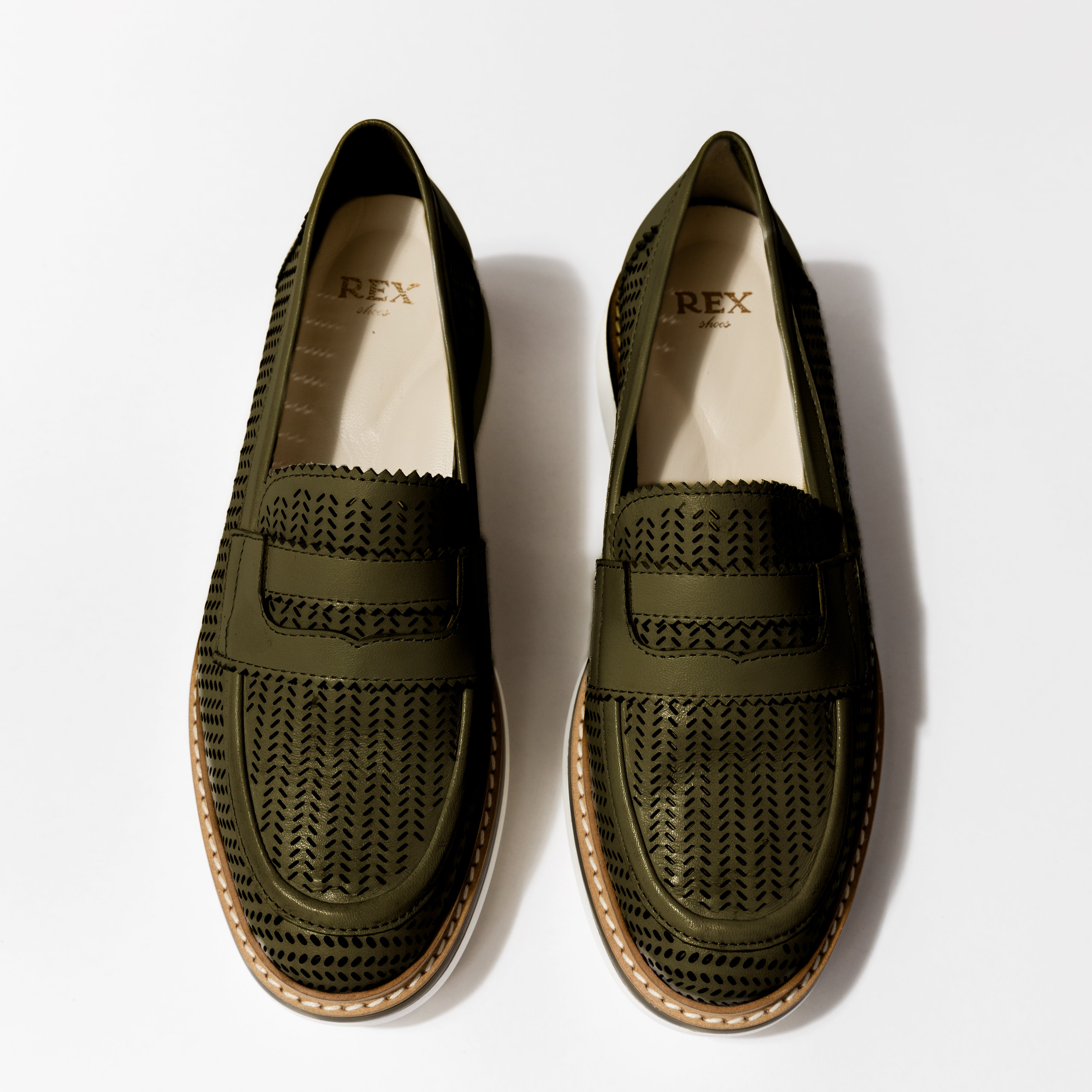 Top view of the &#39;Lauren&#39; luxury loafers in Army Leather, showcasing the custom perforated design and classic strap detail.
